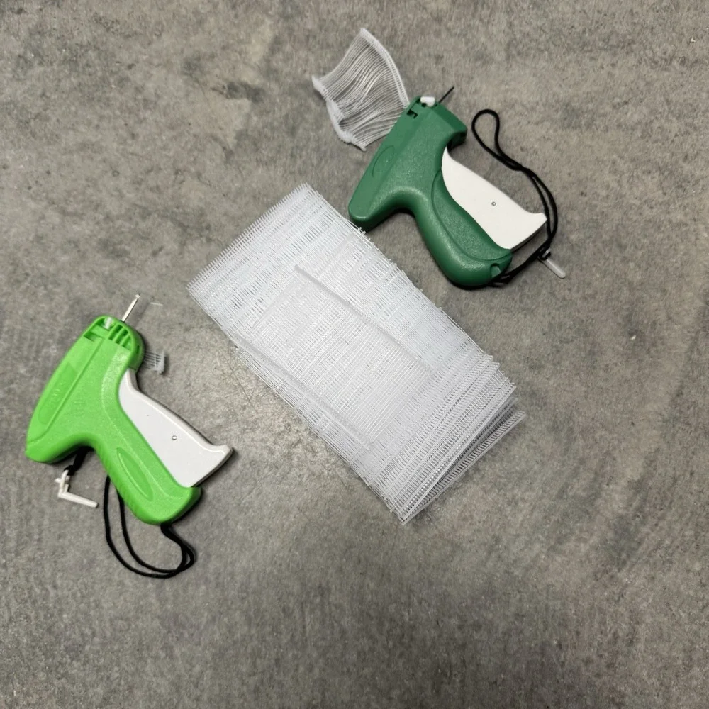 2 Tagging Guns + 1,000+ Plastic Barbs Clothing Price Tag Fasteners Lot